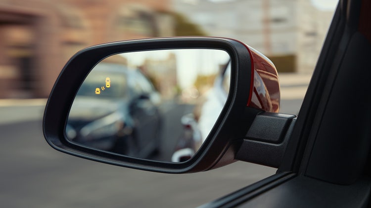 Blind-Spot Collision Warning with Lane Change Assist
