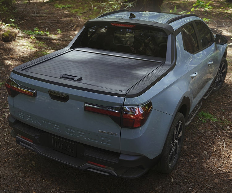 Integrated sliding and lockable tonneau cover